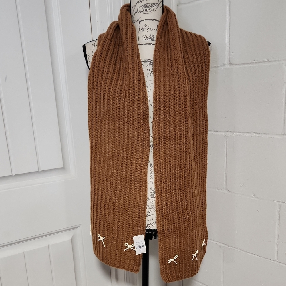 Francesca's Cozy Rib Knit Scarf in Camel With Bow Accents